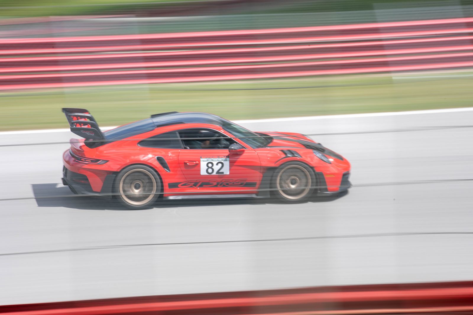 992 GT3 RS at speed against the red and white barriers during a NASA Great Lakes TT weekend at Mid-Ohio